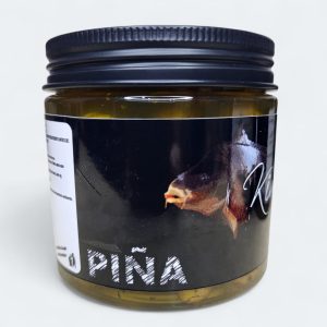 Chufas de anzuelo sabor piña Kimo Baits Magnum 200ml para carpfishing fondos